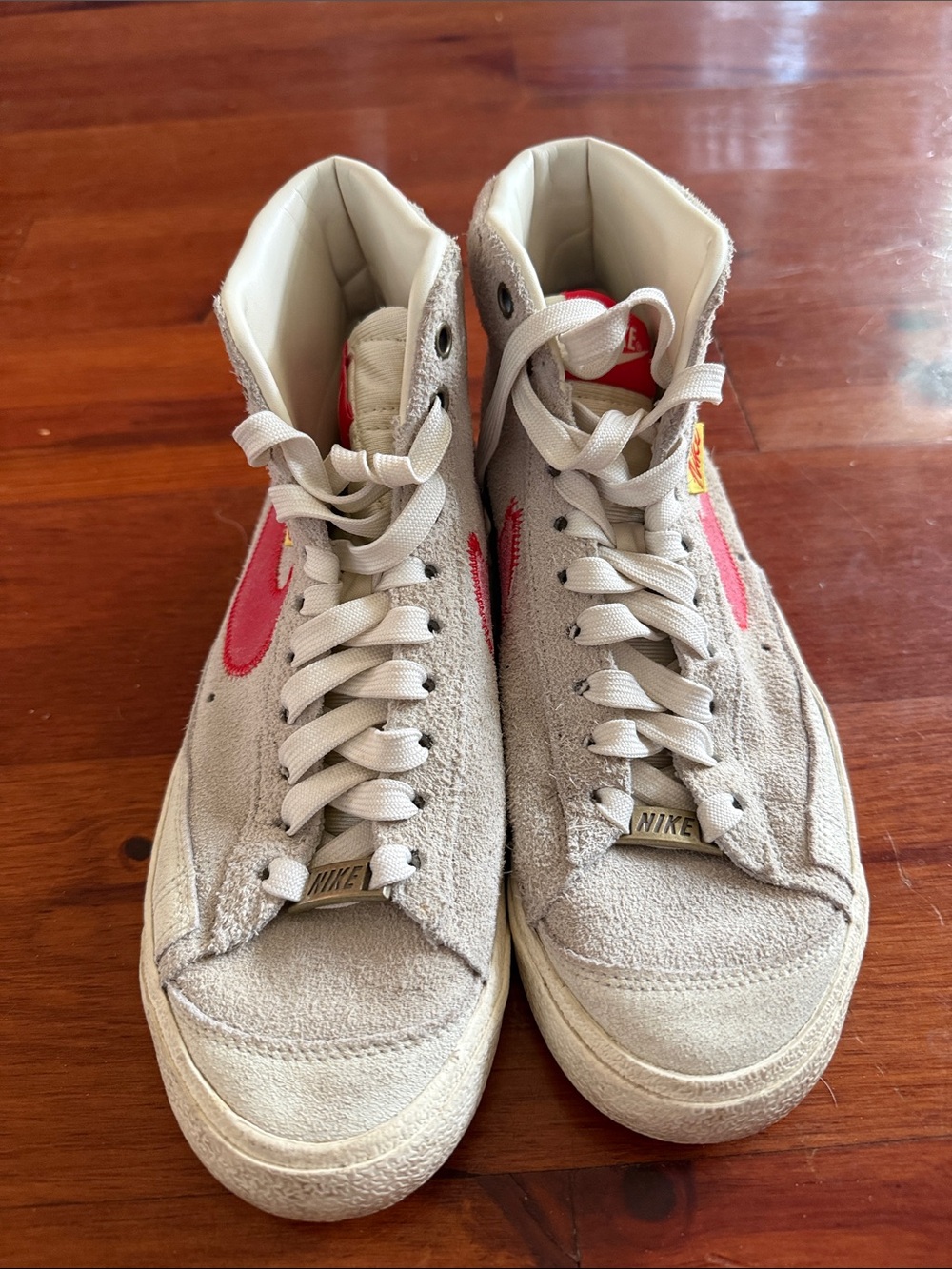 Nike Women’s High-Top Suede Sneakers in Off-White with Pink Swoosh